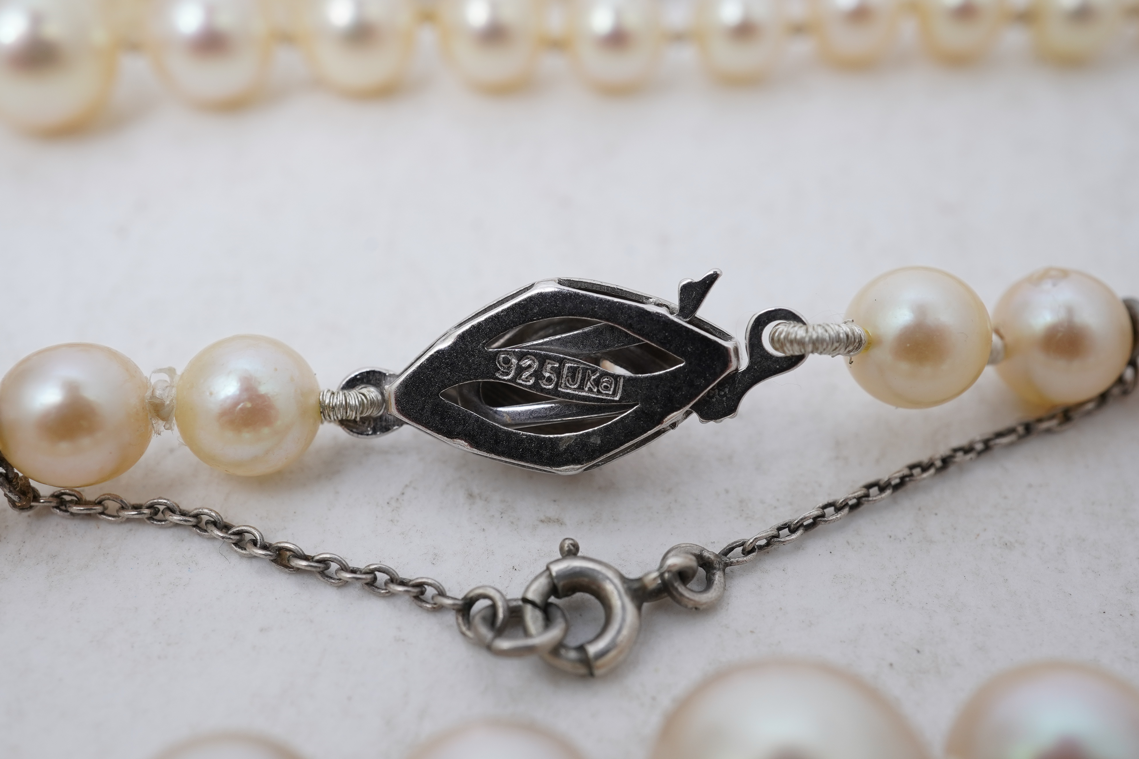 Five cultured pearl necklaces